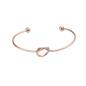 (KNOT BANGLE - ROSEGOLD PLATED STAINLESS STEEL