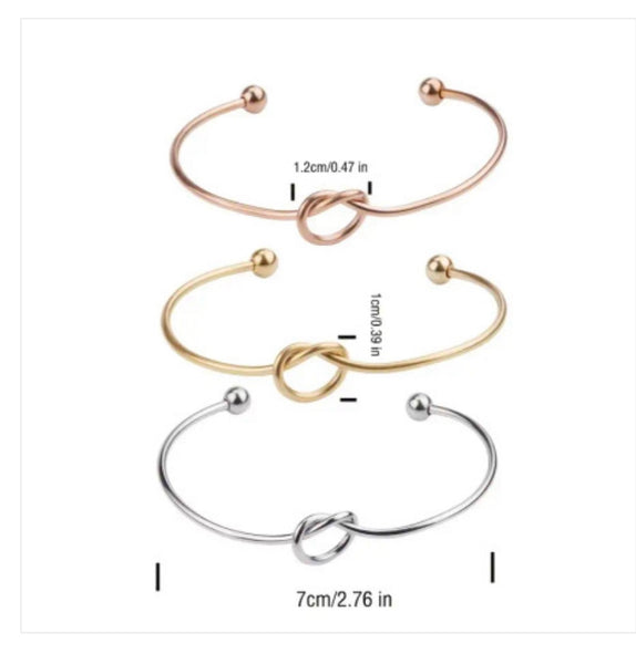 (KNOT BANGLE - ROSEGOLD PLATED STAINLESS STEEL